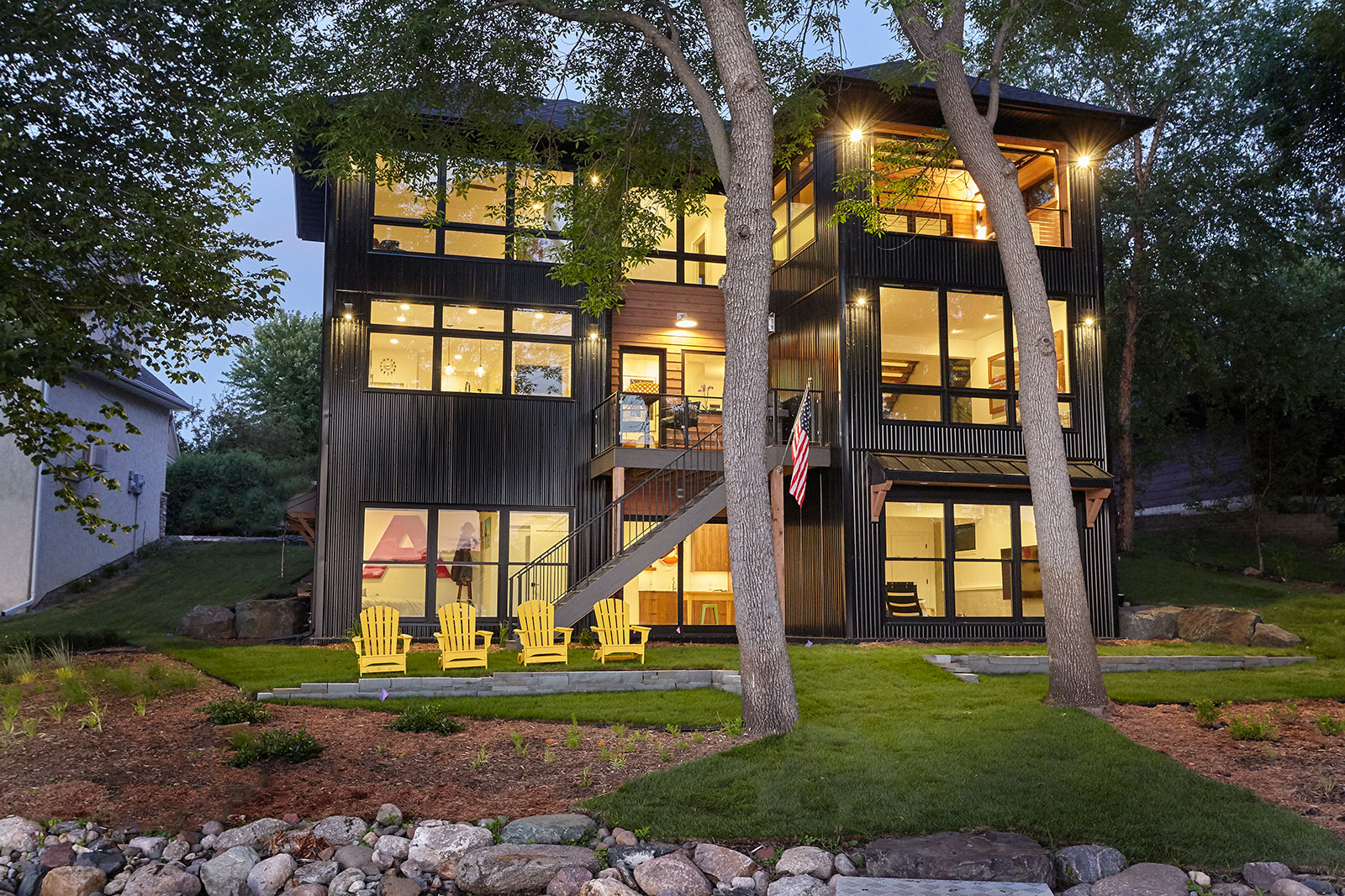 Rockhaven Lake House - Lakeside Exterior at Night | AWAD architects | Architect Designed Homes and Remodels | Minneapolis